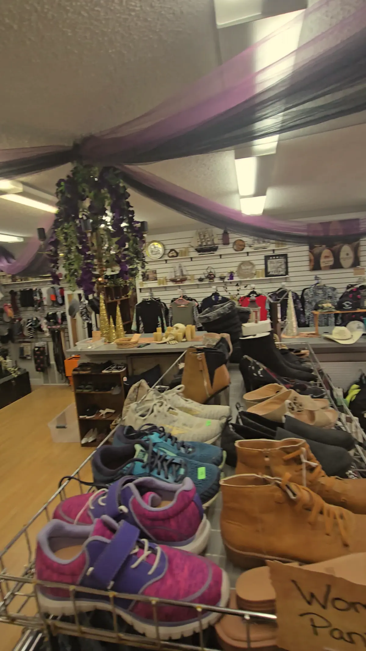 Kids shoes and toys on display